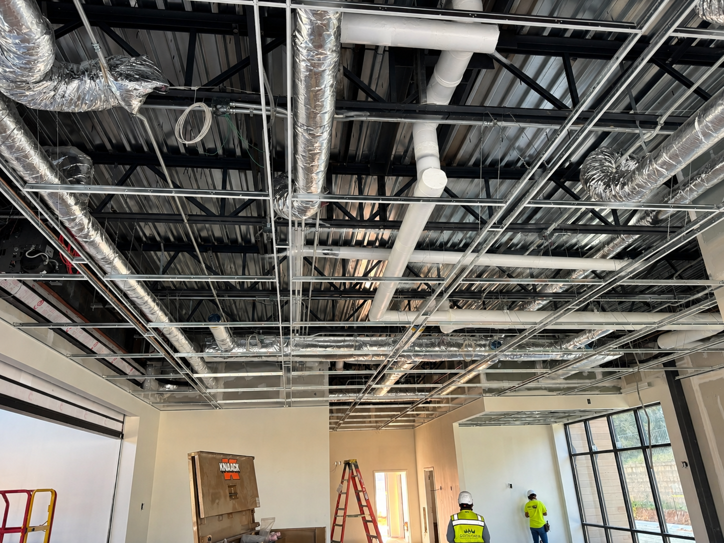 Above-ceiling plumbing rough-in installation at JP Morgan Chase Bank Chapel Hill