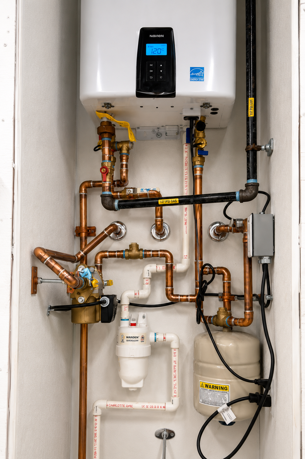 Navien tankless water heater and copper piping installation at Tractor Supply Co. Mebane