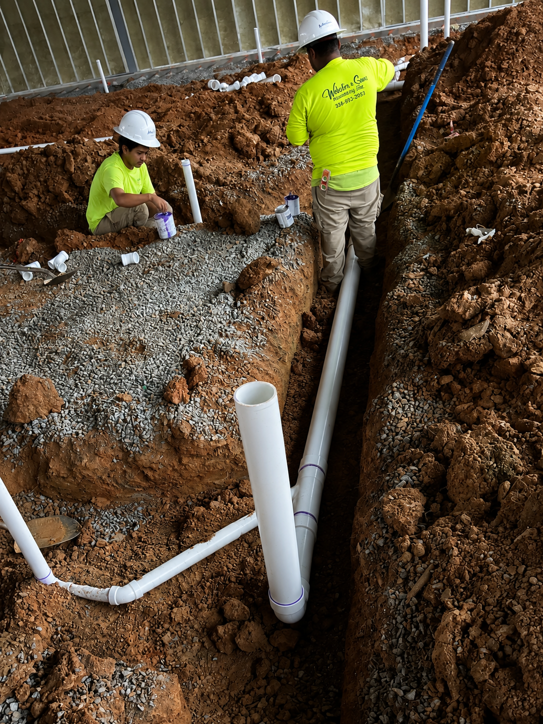 Webster & Sons crew installing underground PVC plumbing at Woodside View Dental Care